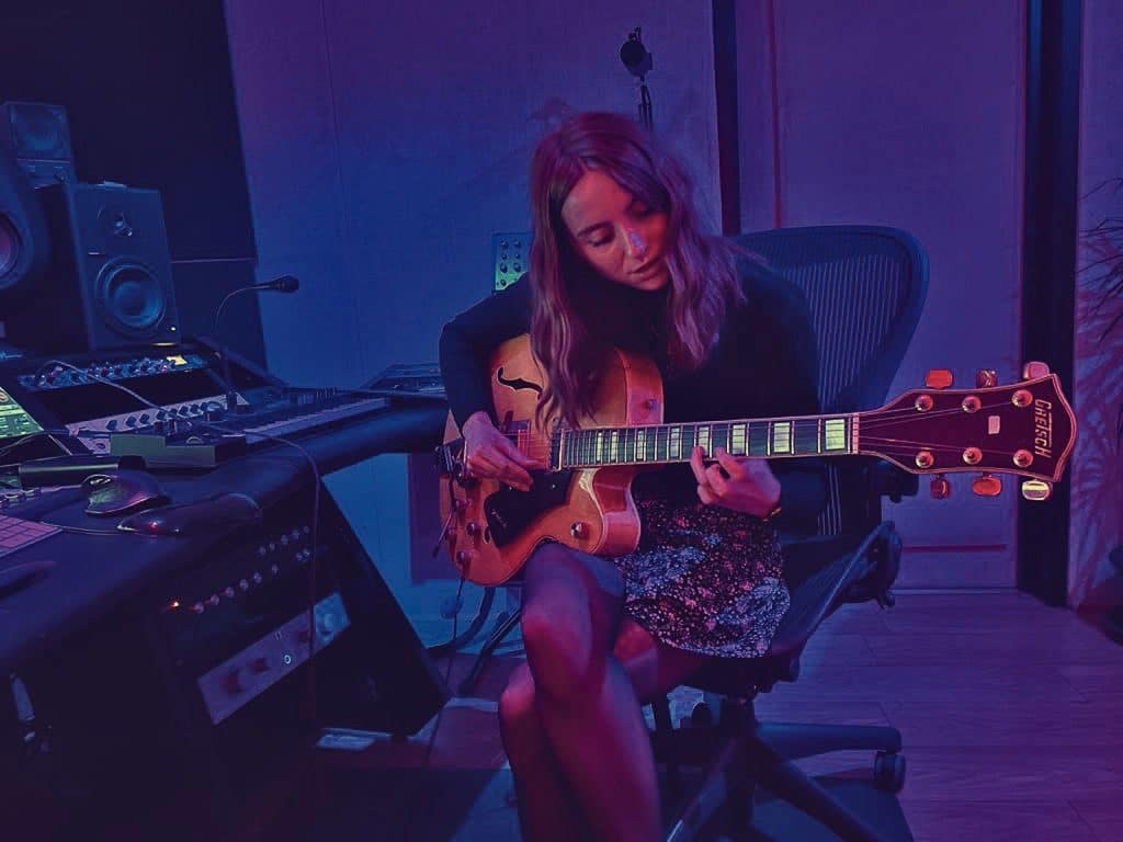 Guitarist recording at Soho Sonic Studios, London
